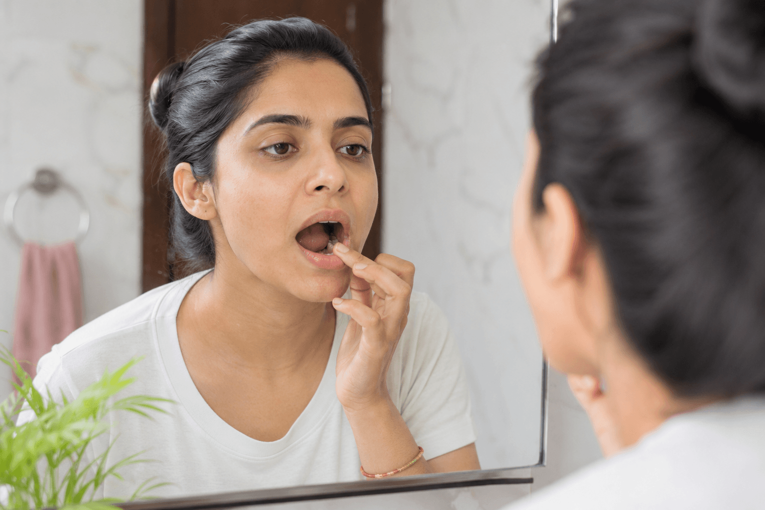 The lump, ulcer, or patch that has not healed in two weeks